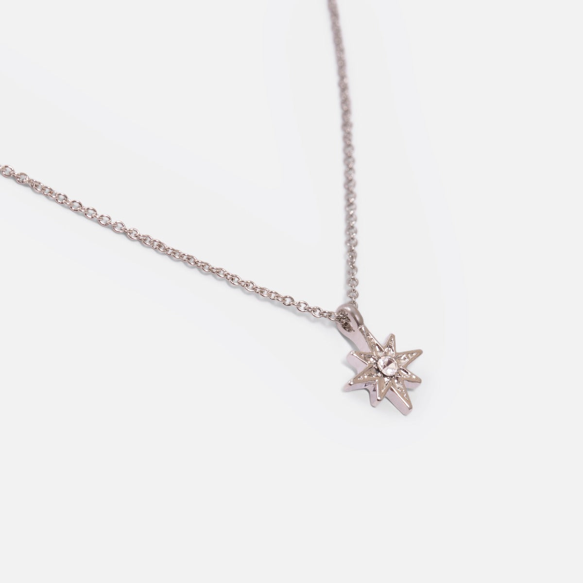 Silver pendant with star charm