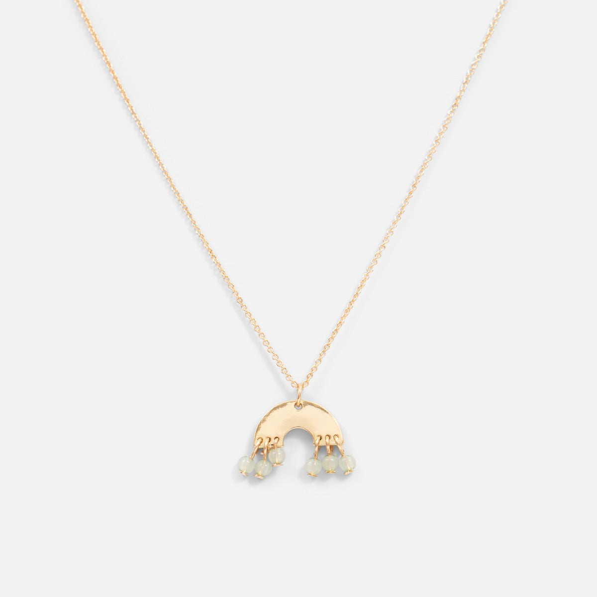 Golden pendant with rainbow