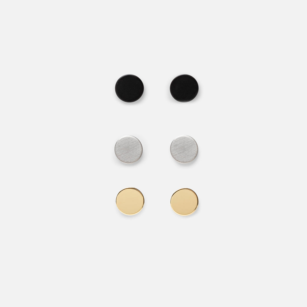 Set of three fixed gold, silver and black earrings