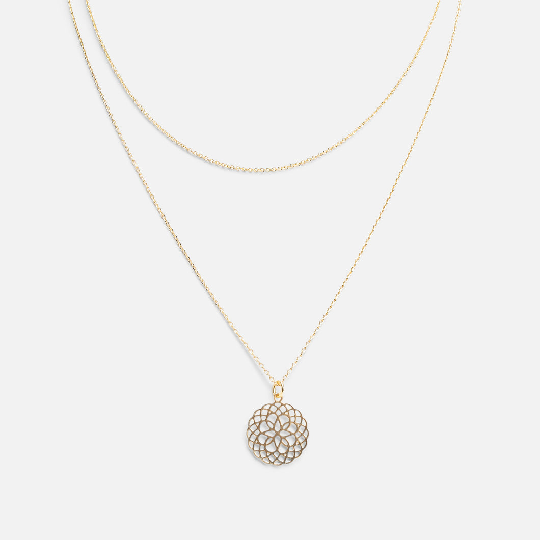Double golden chain necklace with filigree charm