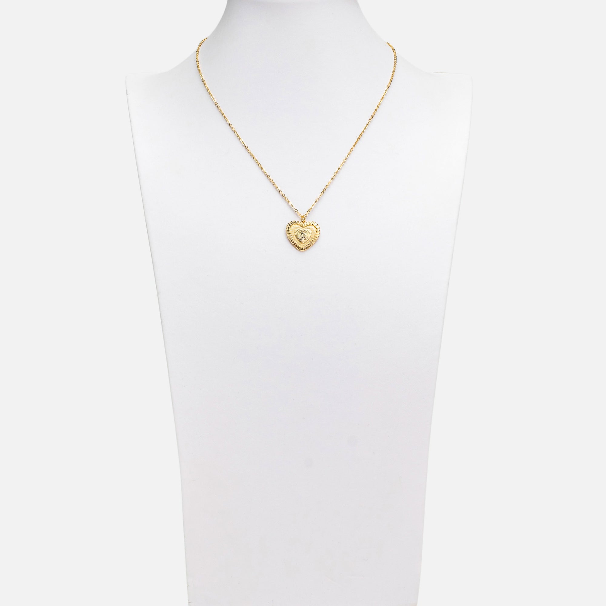 Golden necklace with heart shaped pendant