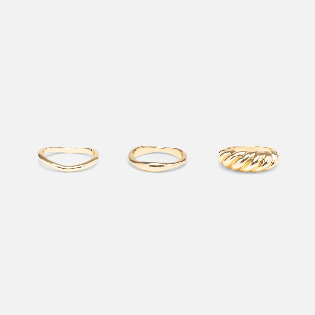 Set of three golden rings with croissant ring