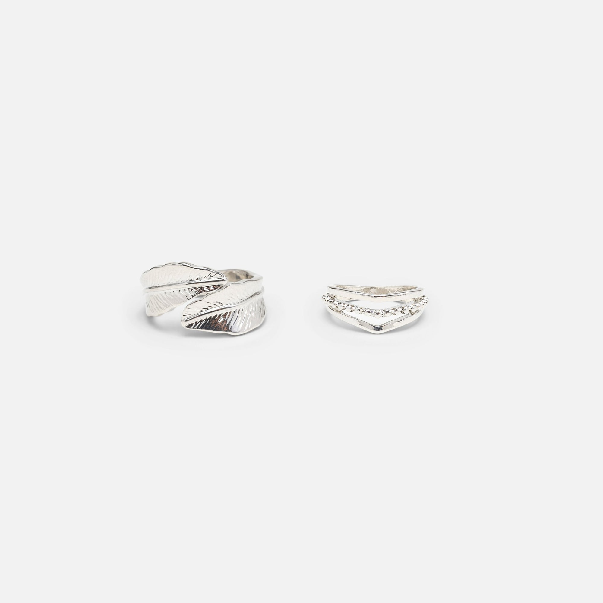Duo of silver leaf and v shape rings