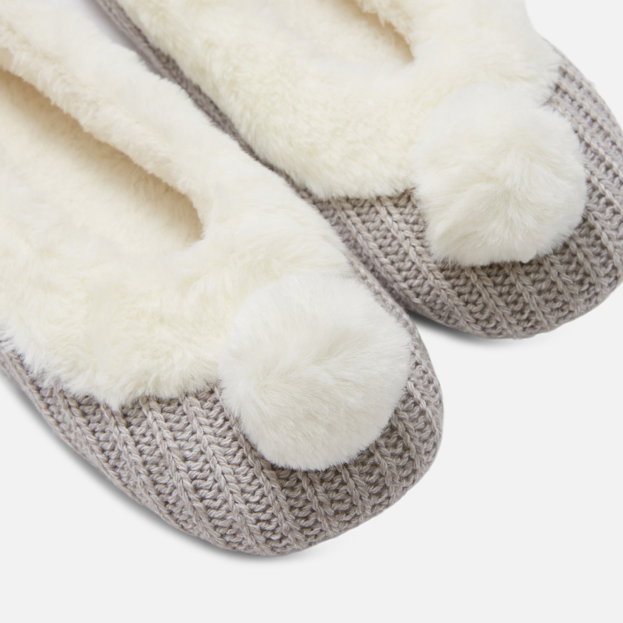 Grey slippers with beige pompoms