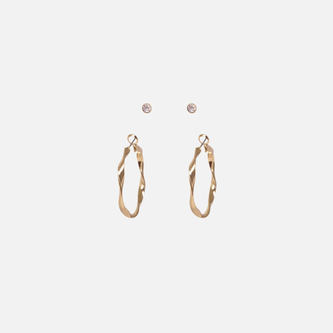 Twisted hoop earrings and sparkling stones