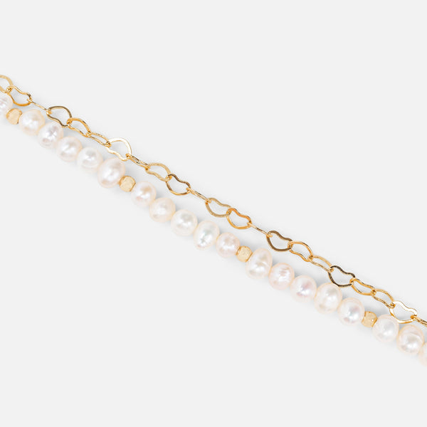 Load image into Gallery viewer, Golden bracelet with heart and pearl chains 
