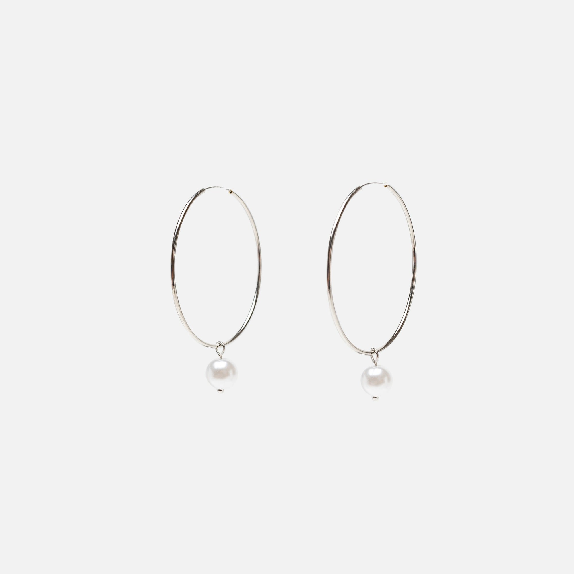Silver hoop earrings with pearl charm 