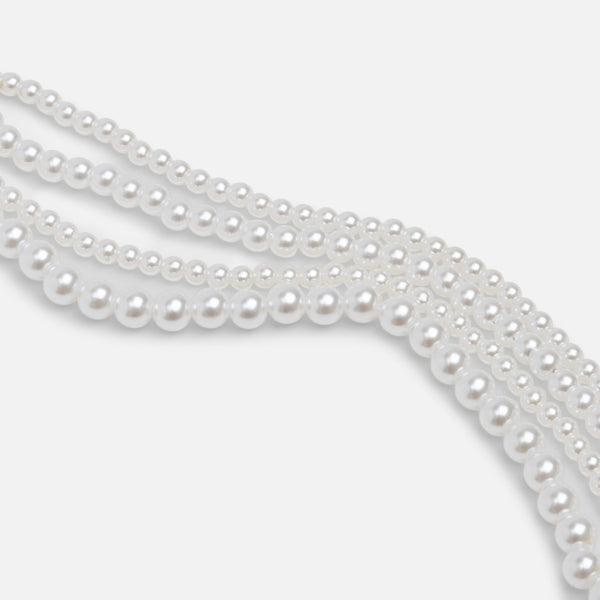 Load image into Gallery viewer, White pearl bracelet with four rows of pearls and a love charm
