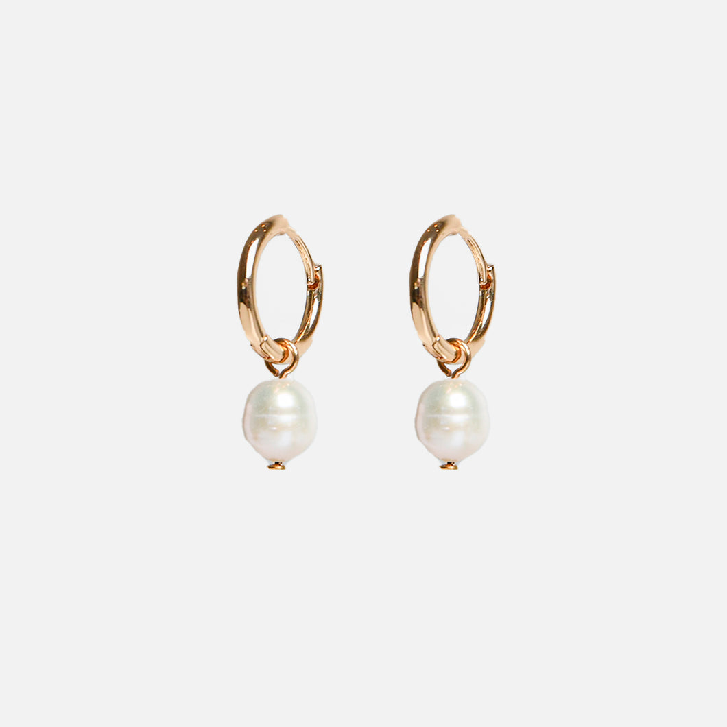 Golden hoop earrings with pearl