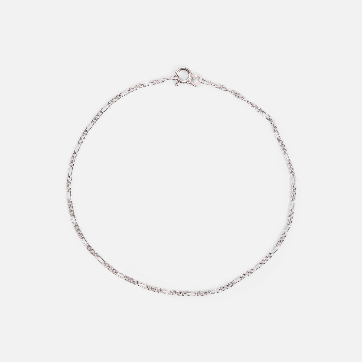 Thin sterling silver ankle chain with figaro mesh