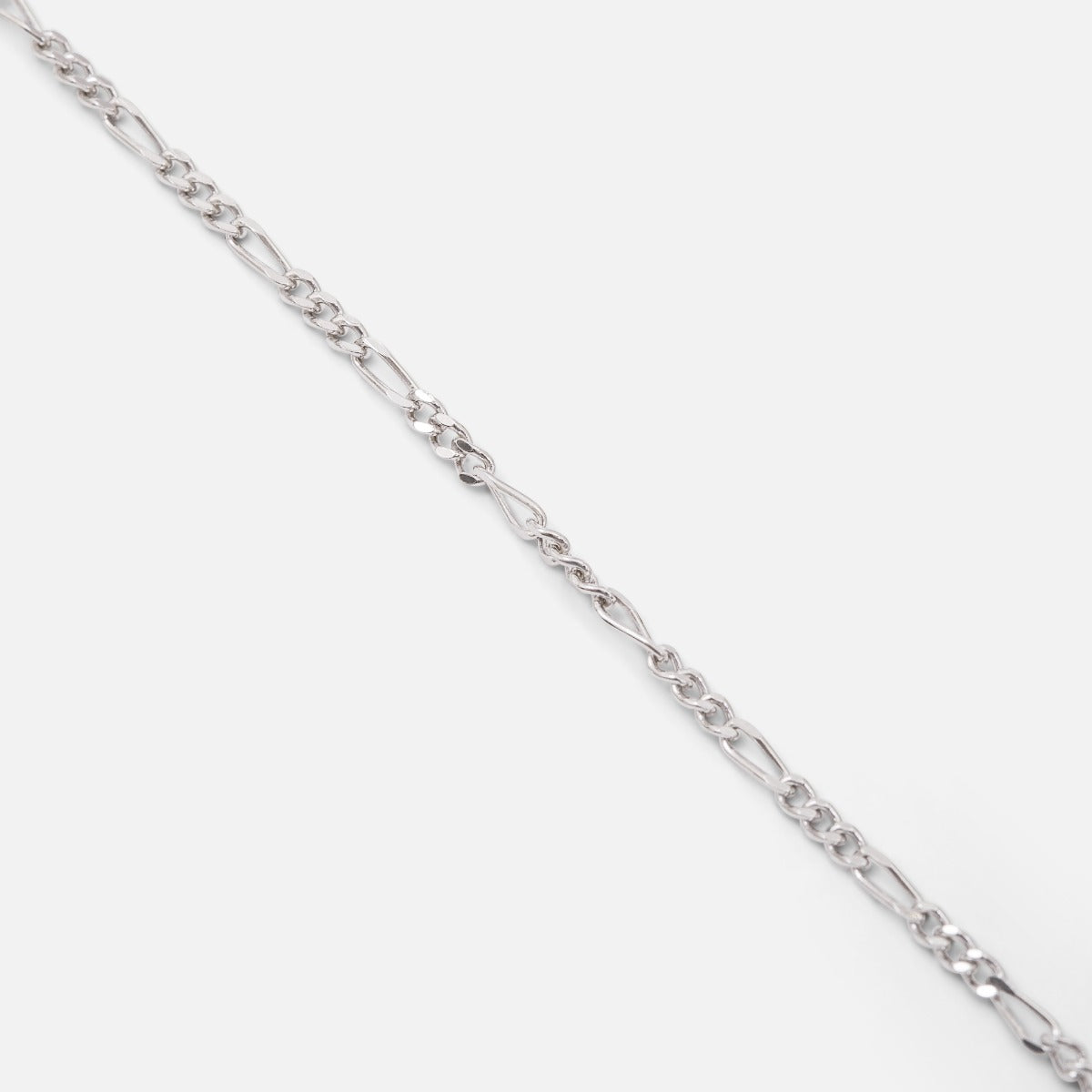 Thin sterling silver ankle chain with figaro mesh