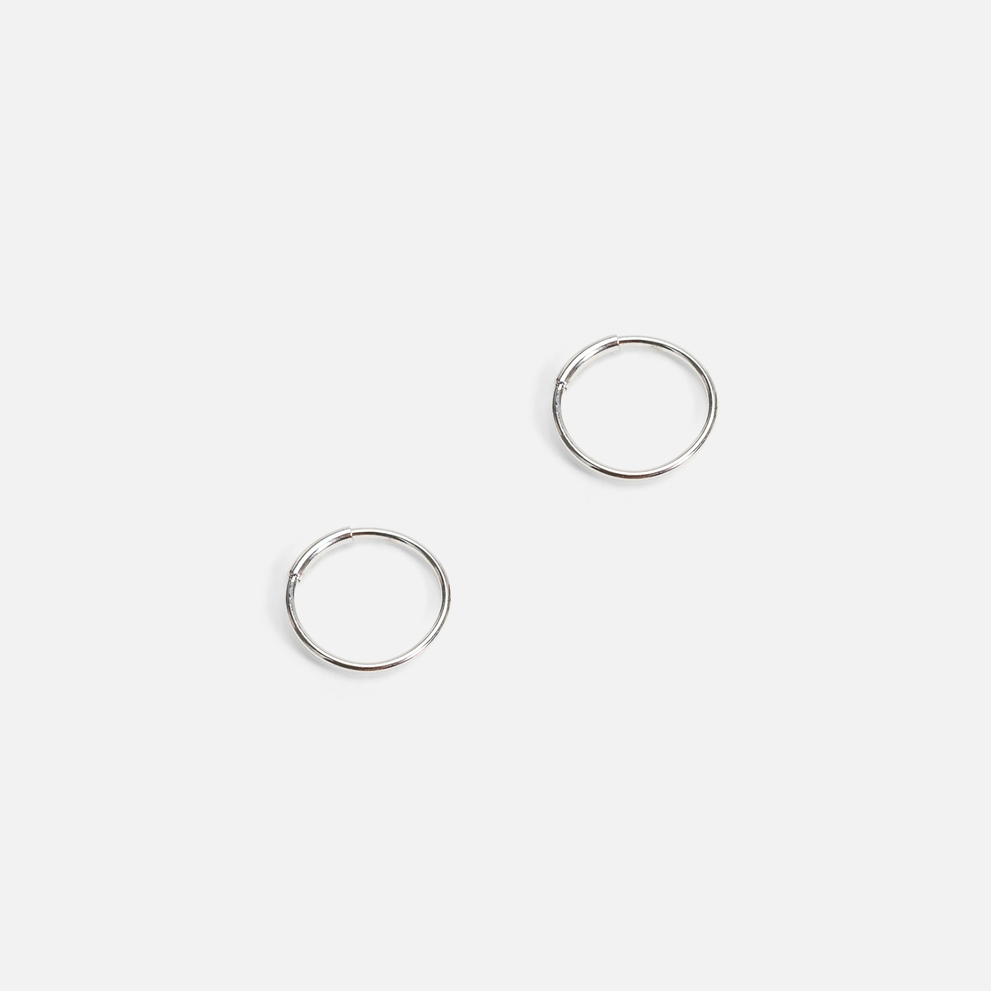 Small silver stainless steel hoops
