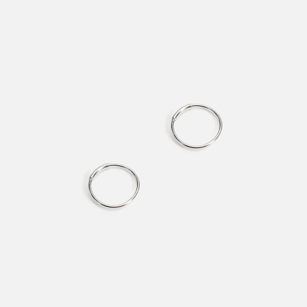Load image into Gallery viewer, Small silver stainless steel hoops
