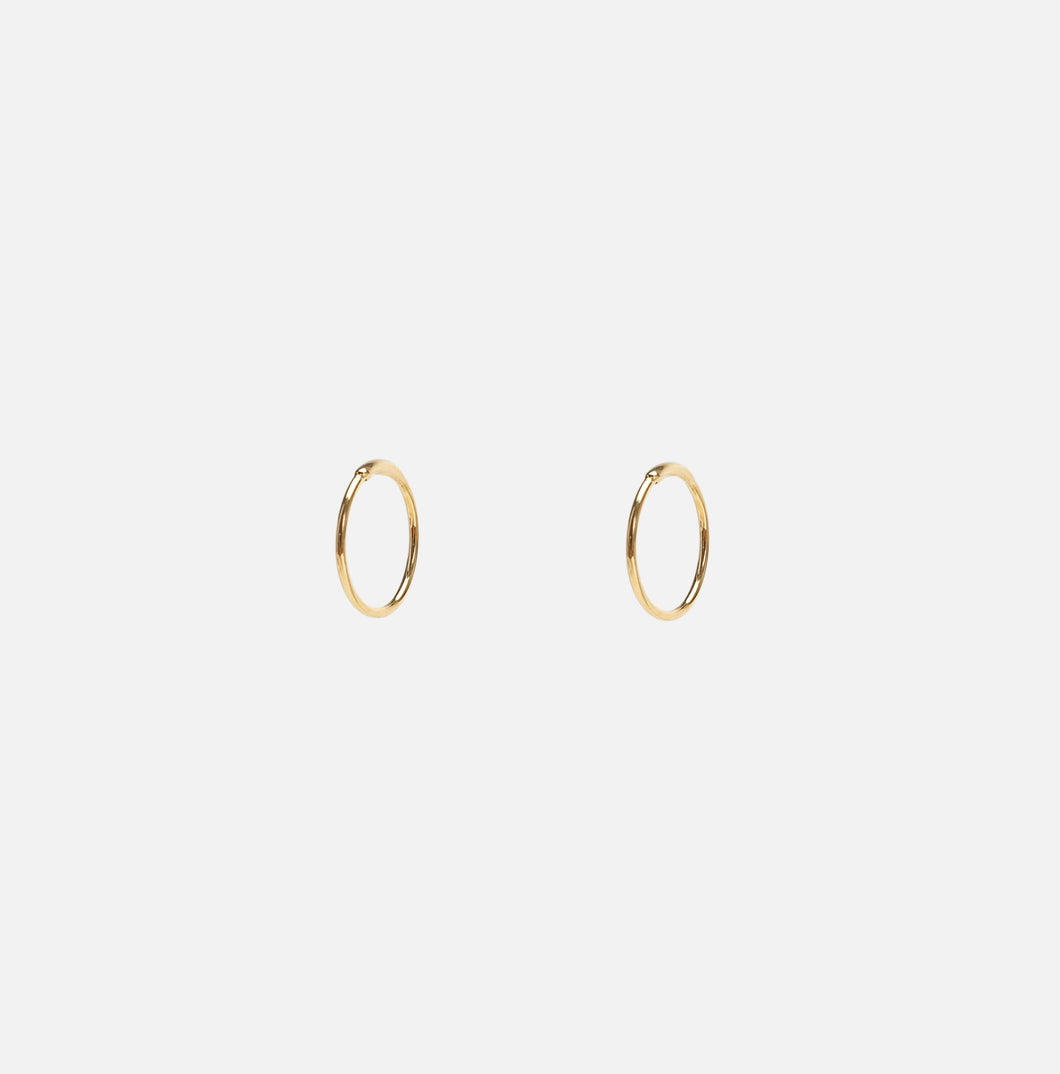 Small golden stainless steel hoops