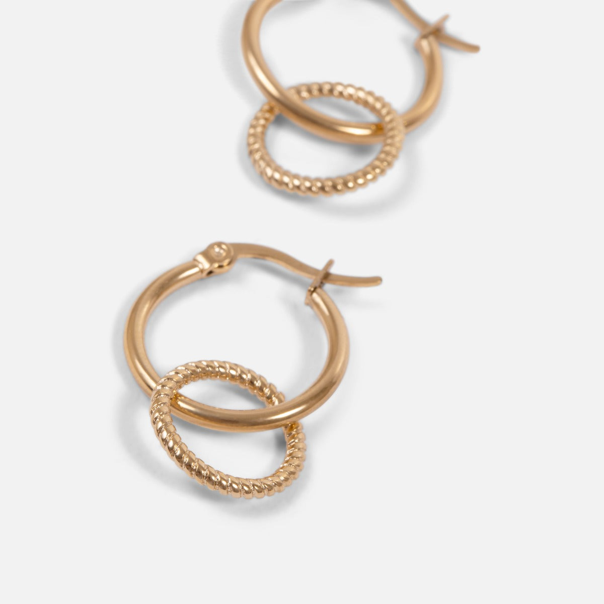 Golden stainless steel earrings with two different hoops