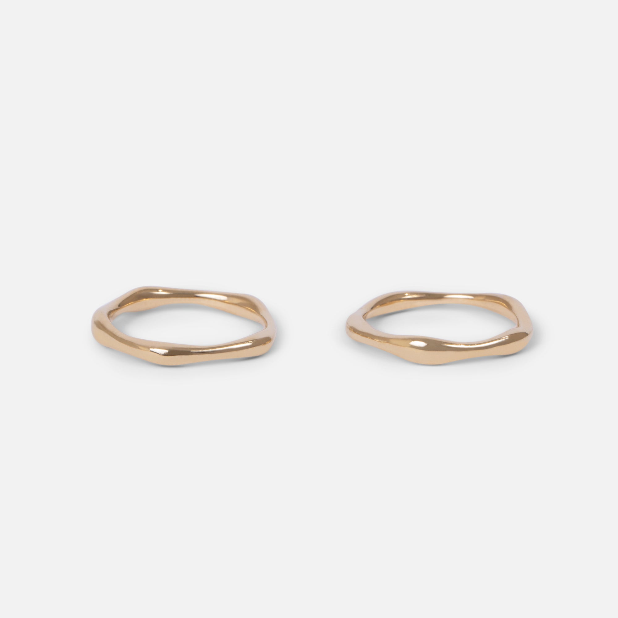 Duo of simple golden rings in stainless steel