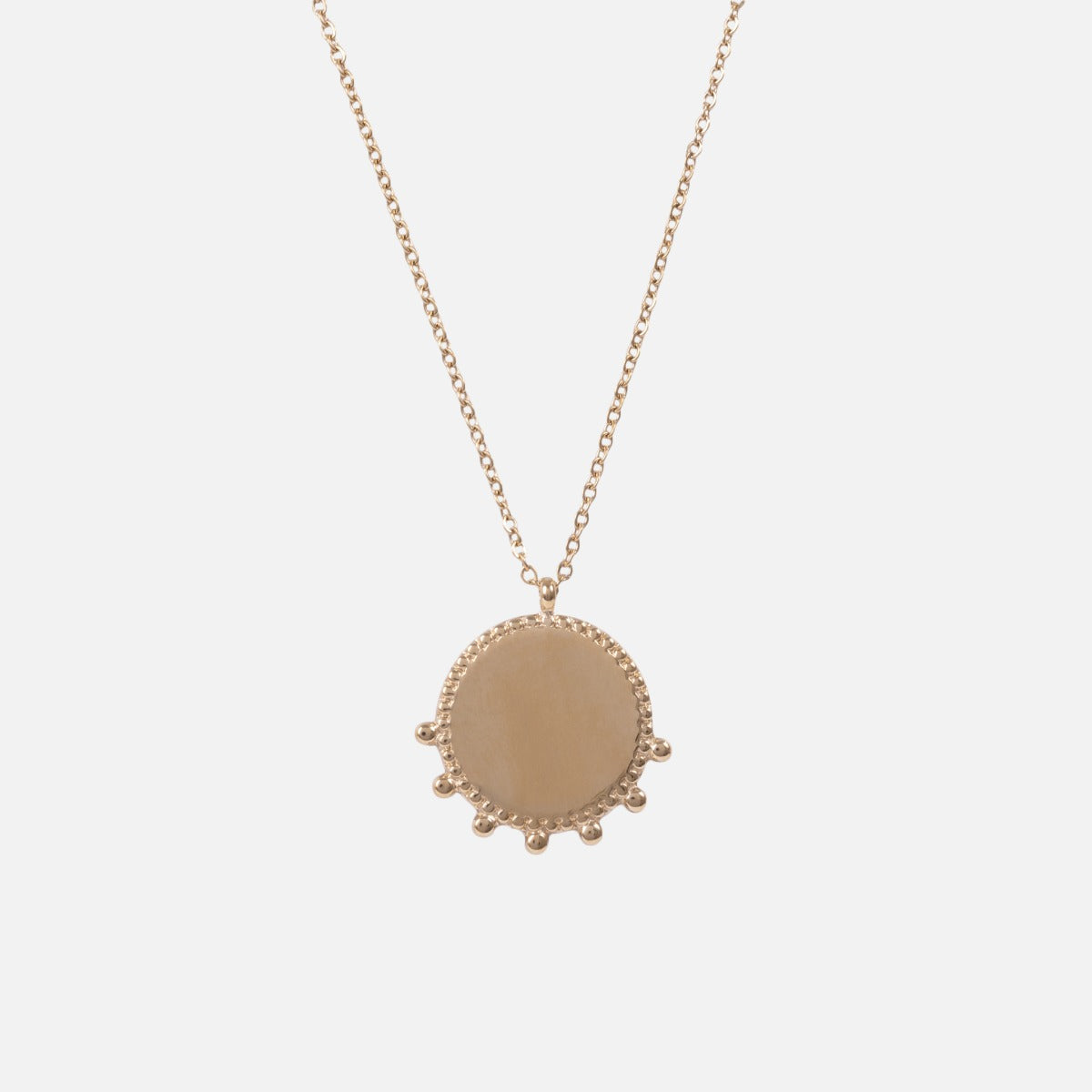 Golden stainless steel necklace with original circular medallion