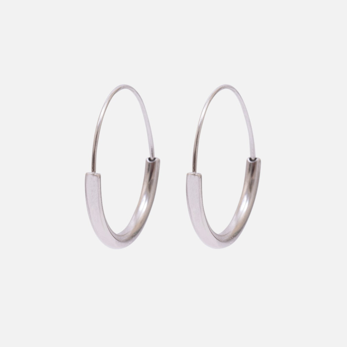 Silver stainless steel hoop earrings with wide half circle