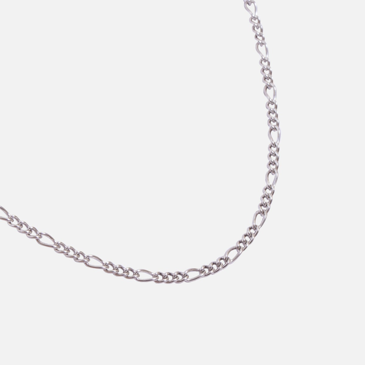 Minimalist necklace in stainless steel and its figaro mesh
