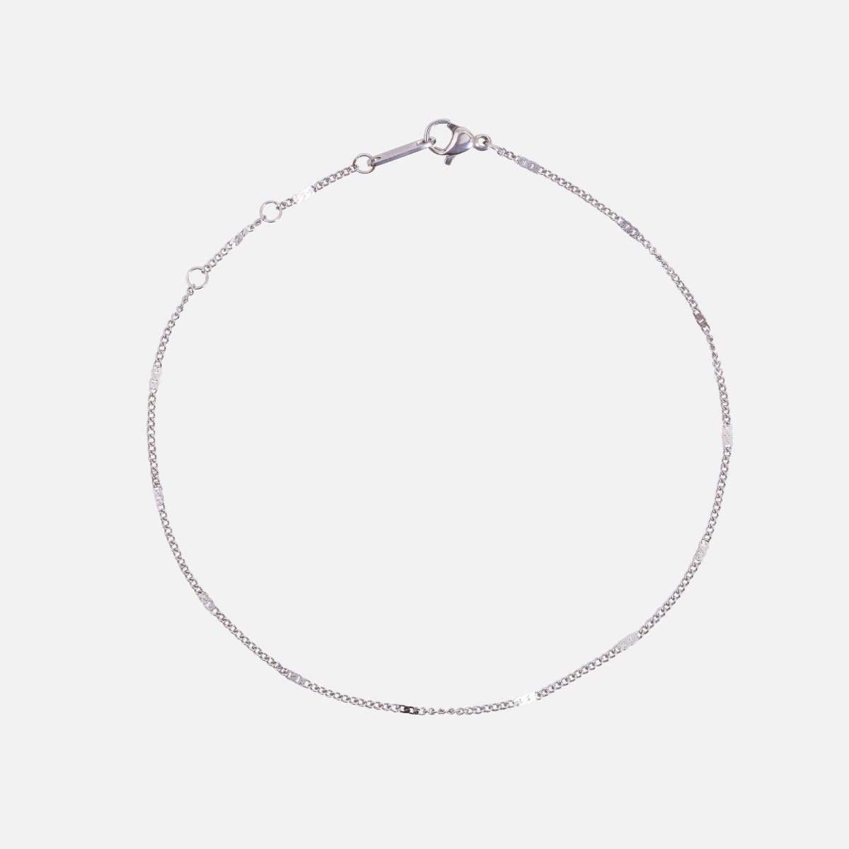 Chaine de cheville avec insertions plates en acier inoxydable