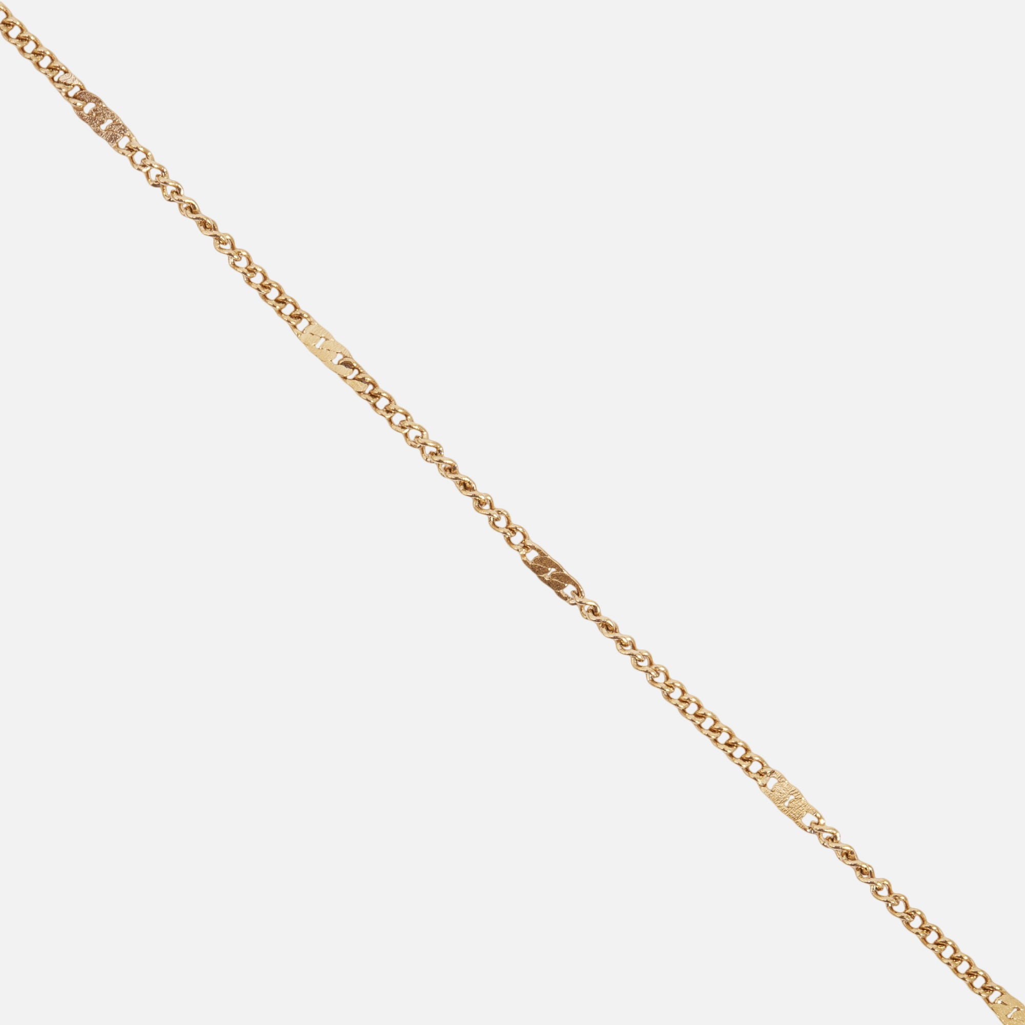 Stainless steel golden bracelet with flat inserts