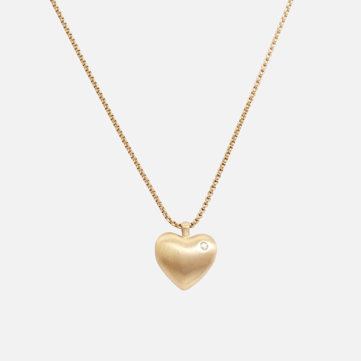 Golden stainless steel pendant with heart and small cubic zirconia stone