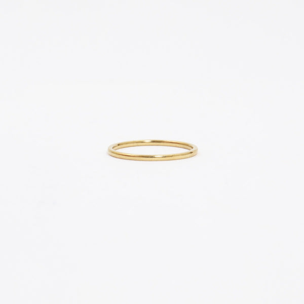 Load image into Gallery viewer, Set of two golden stainless steel rings with an emerald stone
