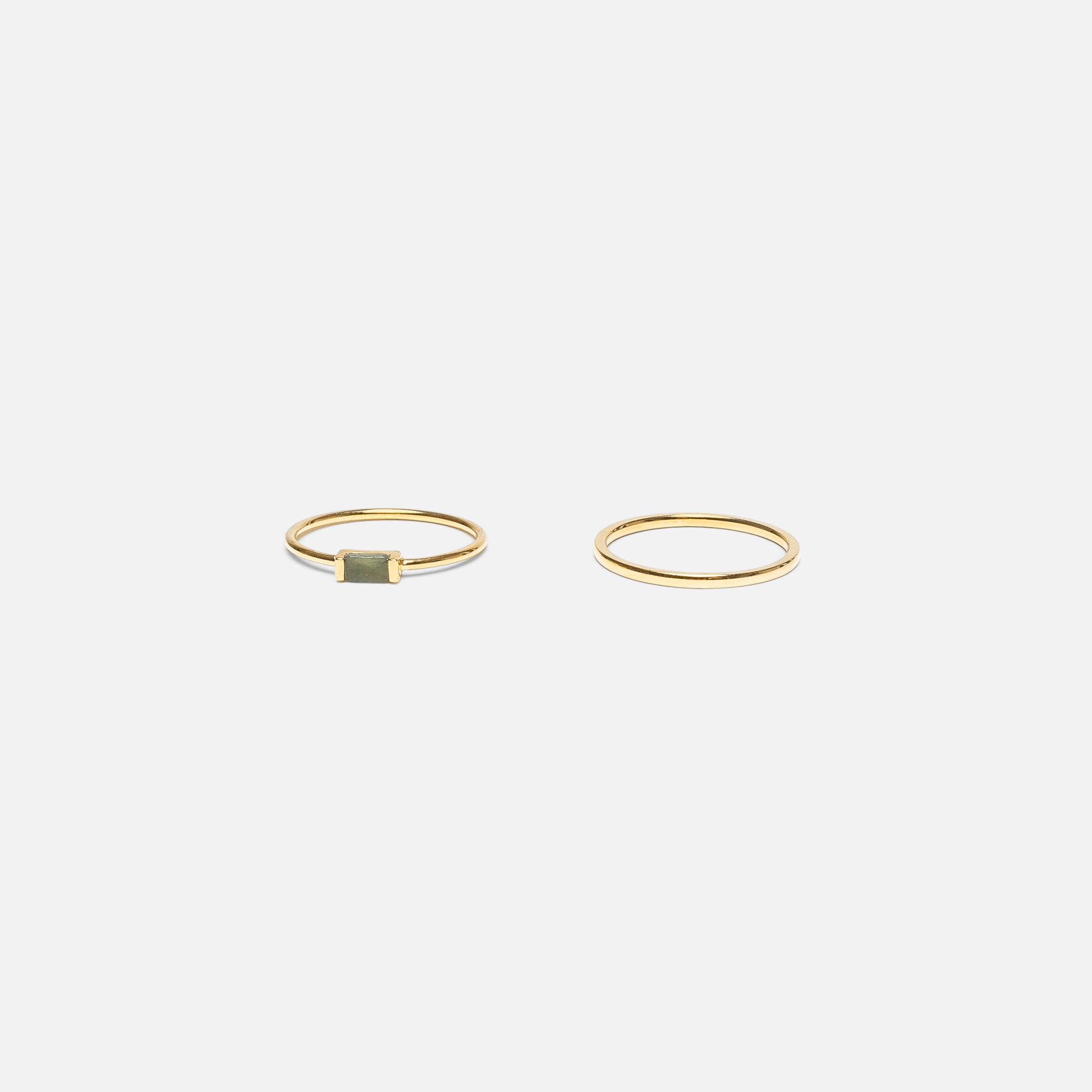 Golden ring set with green square stone in stainless steel
