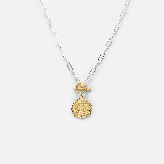 Silvered chain with golden medallion in stainless steel