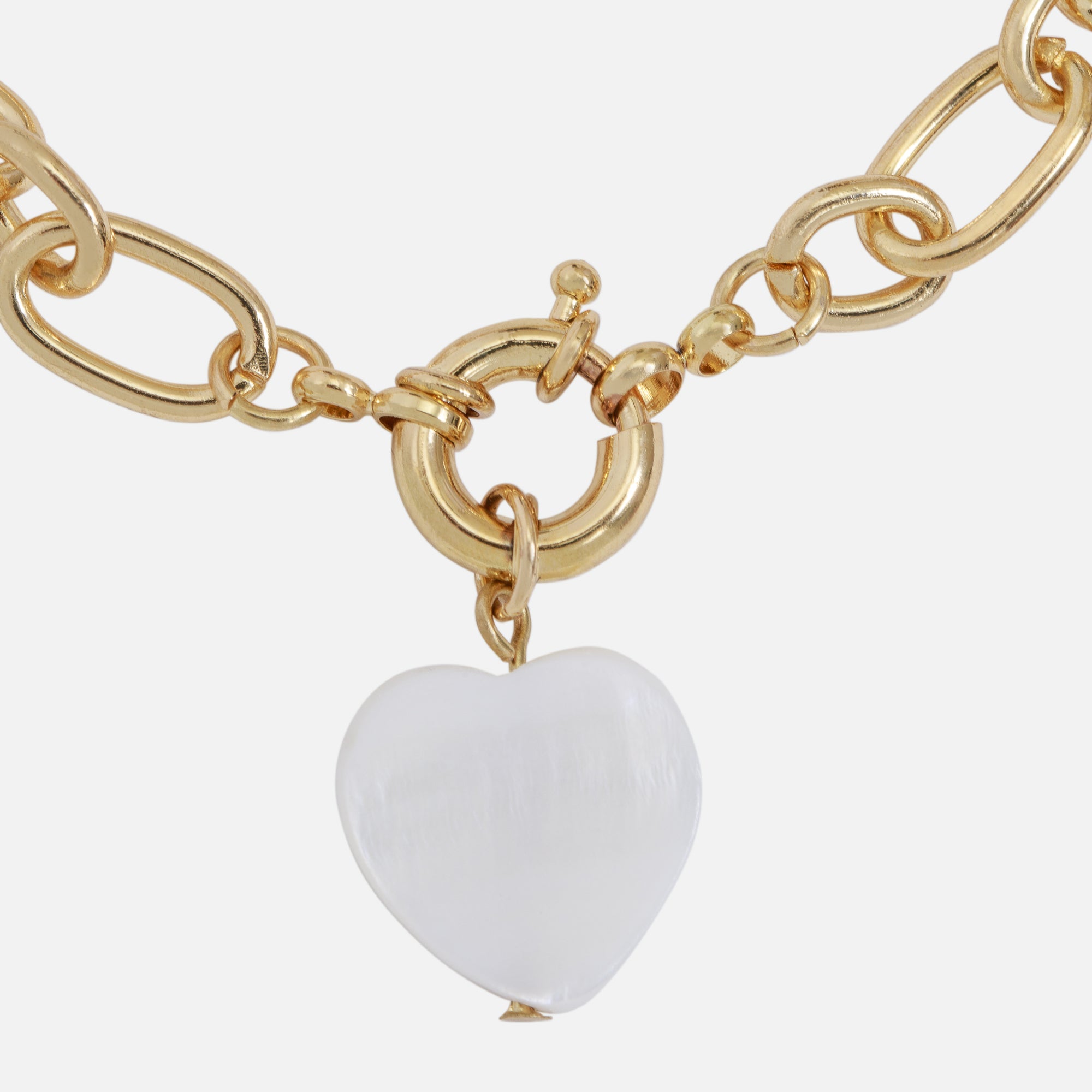 Gold bracelet with white heart charm