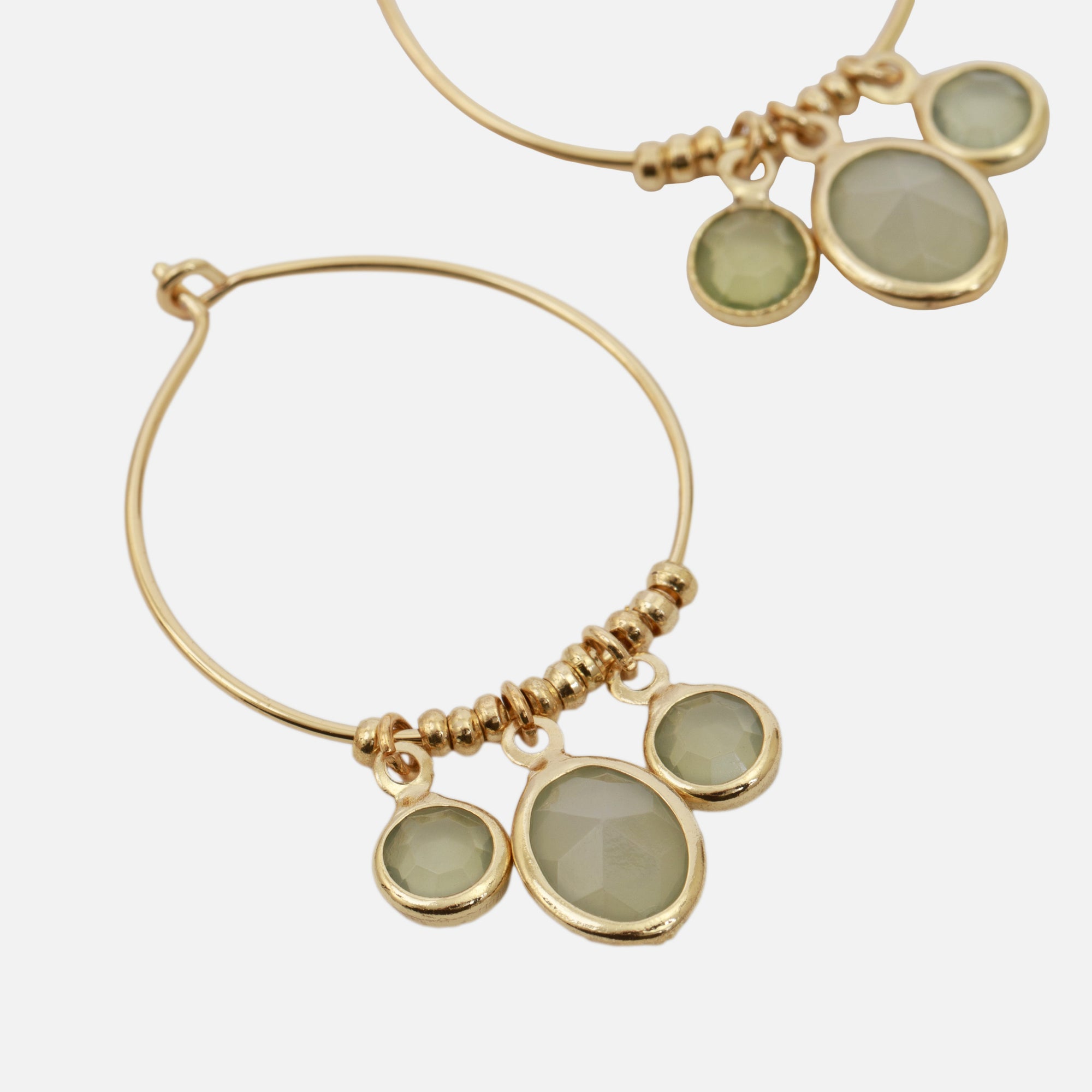 Golden hoop earrings with 3 green stones and golden beads