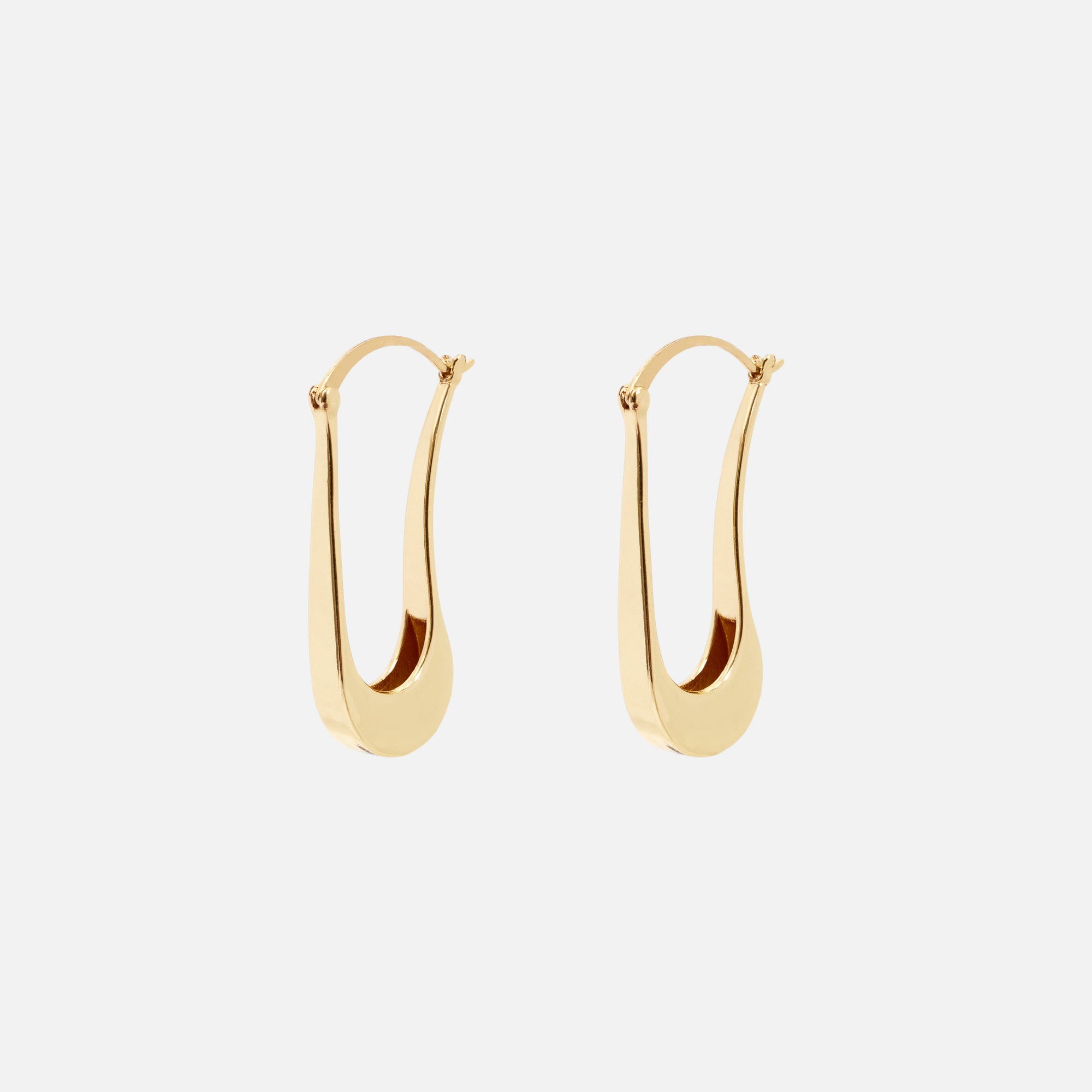 Long golden oval hoop earrings 