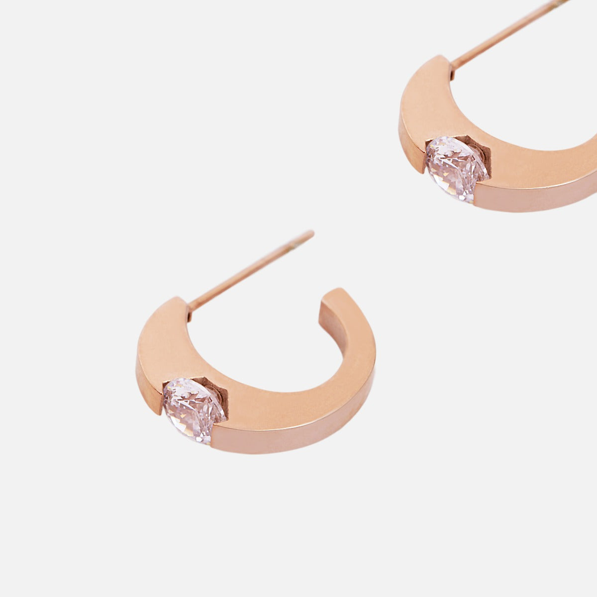 Large golden hoop earrings with cubic zirconia