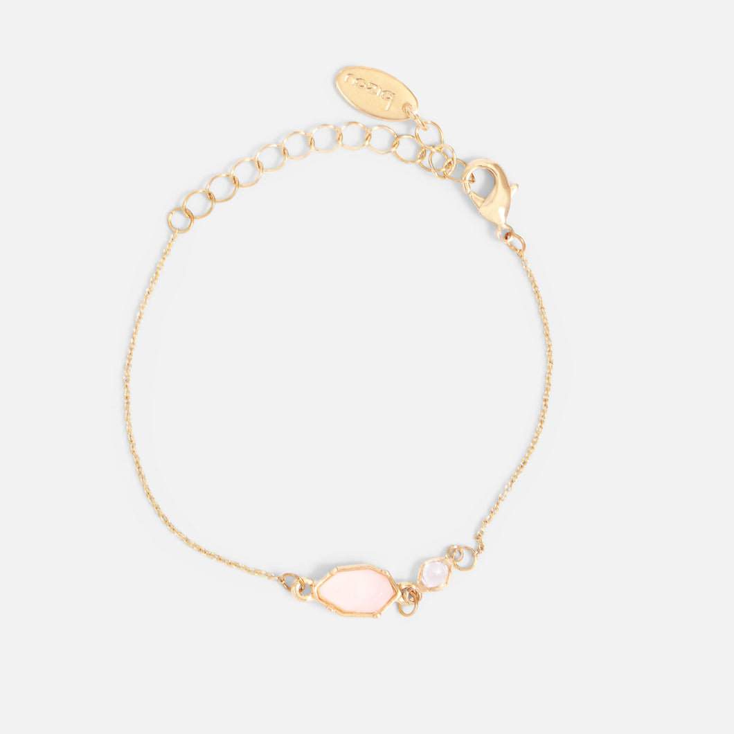 Golden bracelet with pale pink and sparkling stone