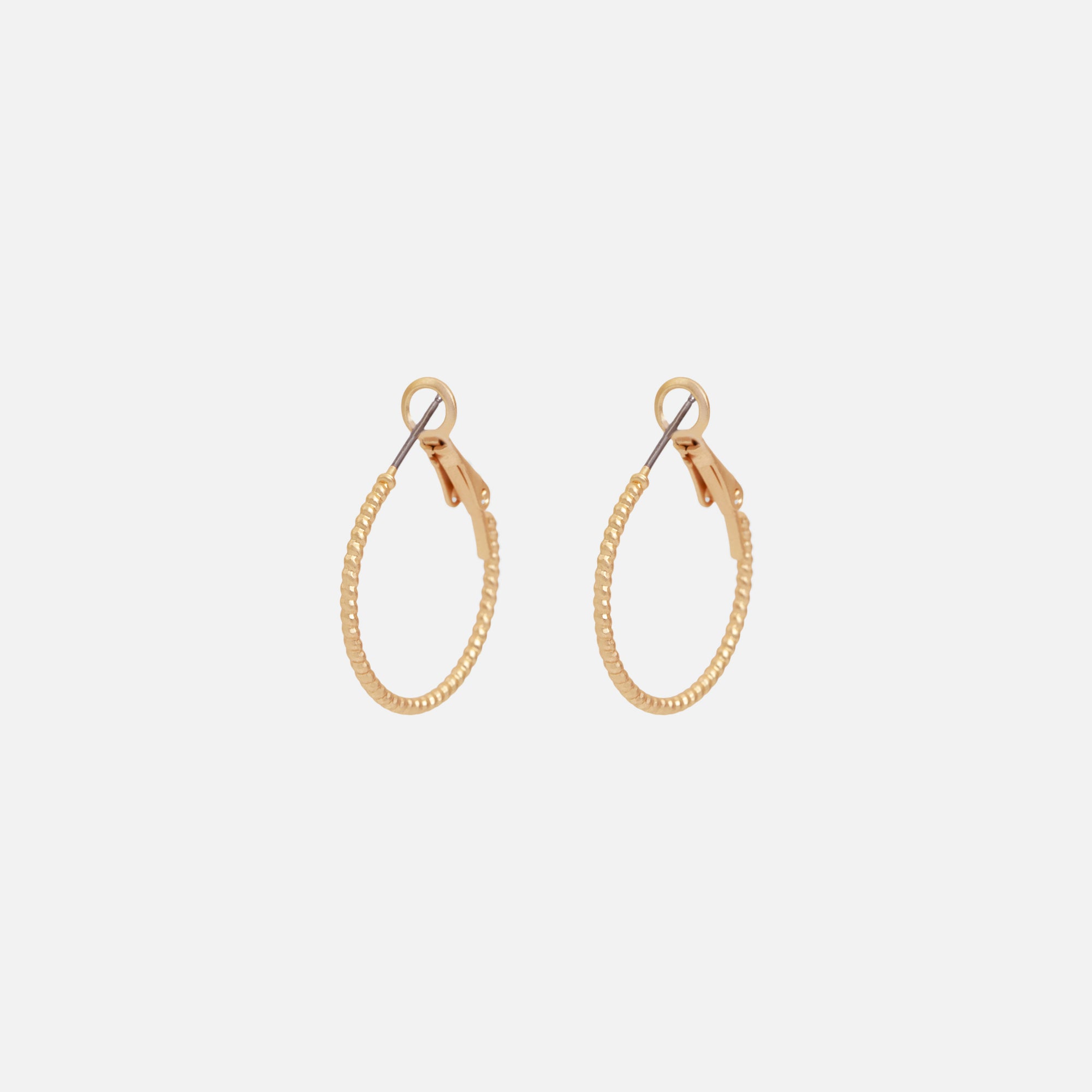 Duo of golden hoop earrings and mother-of-pearl pendant earrings