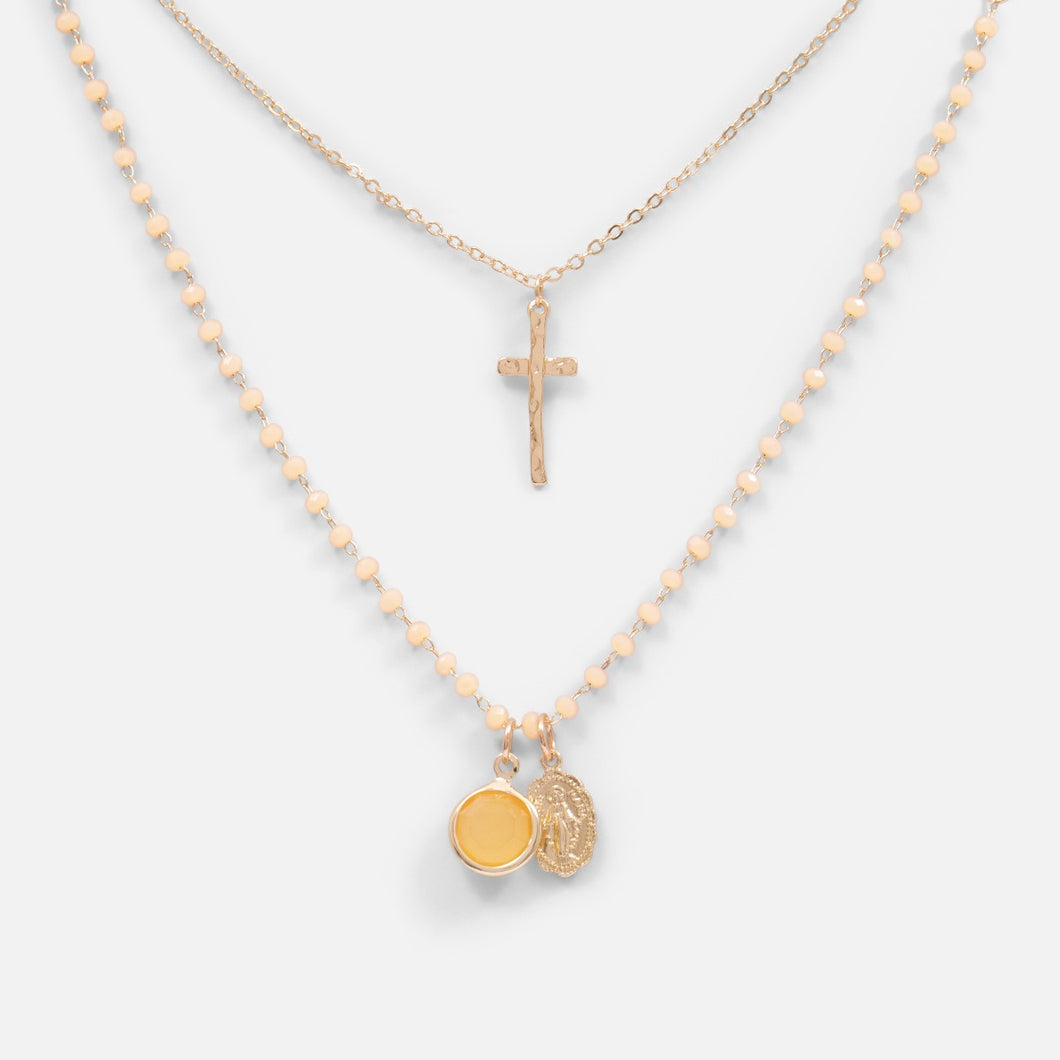 Set of two pendants with golden cross and circular charms