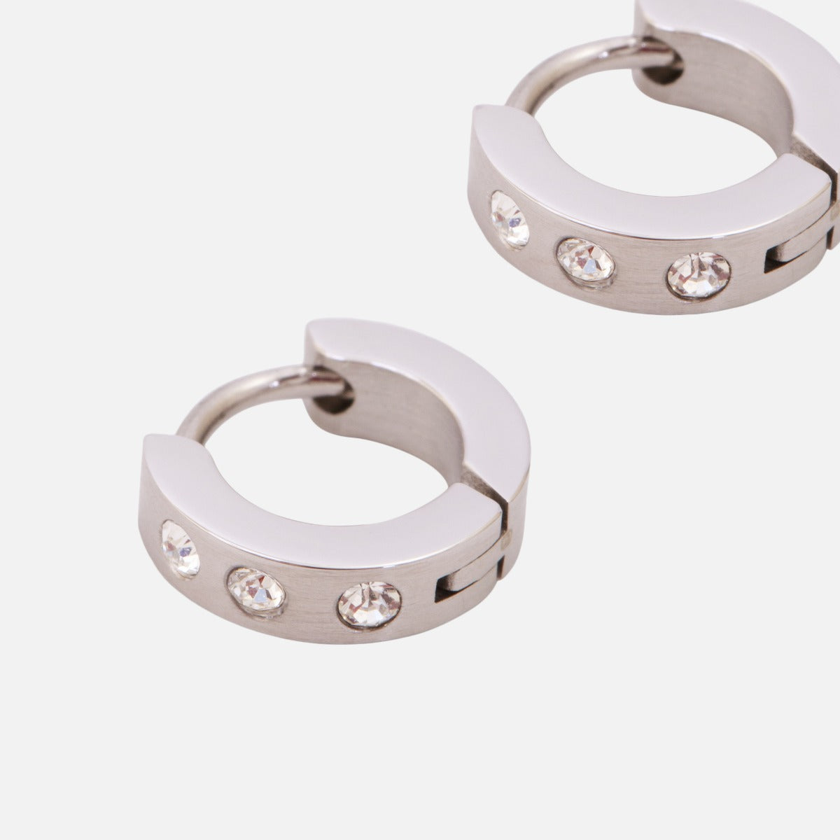 10 mm silvered hoop earrings with cubic zirconia