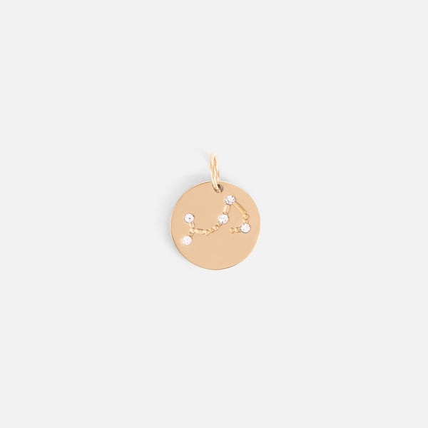 Load image into Gallery viewer, Small golden charm engraved with the zodiac constellation &quot;scorpio&quot;
