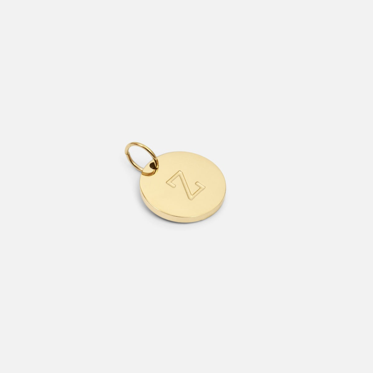 Petite breloque dorée symbolique gravée lettre de l’alphabet "z"