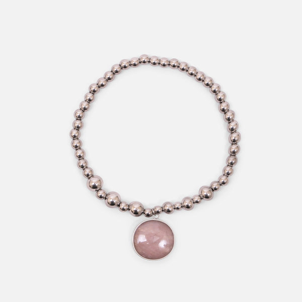 Load image into Gallery viewer, Silver and elastic stainless steel bracelet with pale pink mother-of-pearl round stone
