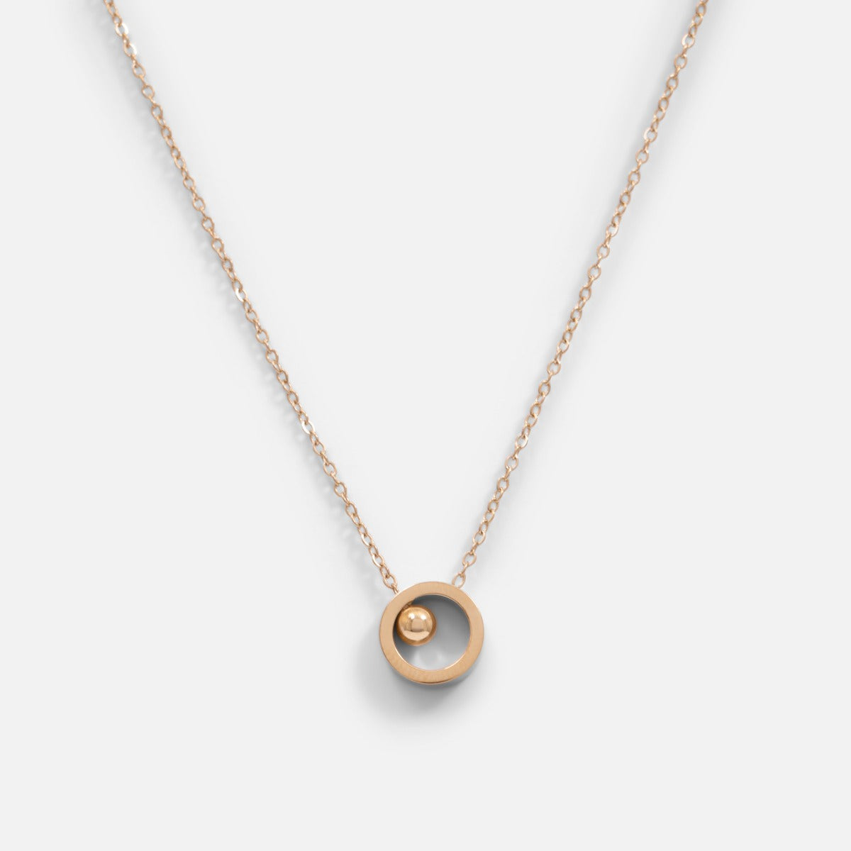 Golden stainless steel necklace with small round charm and bead