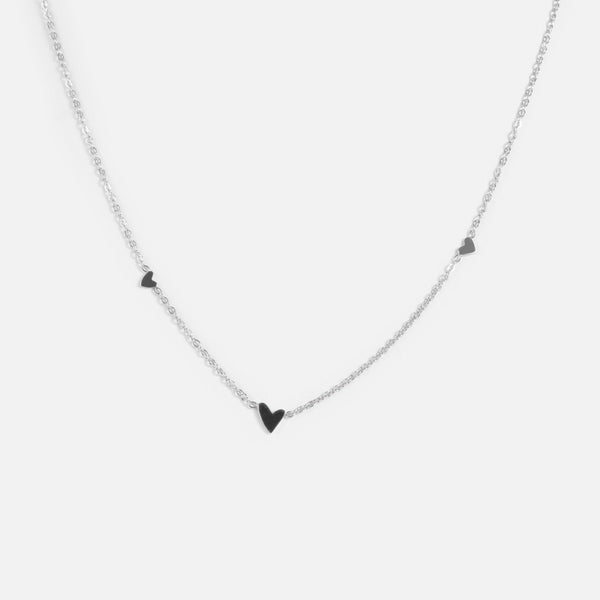 Load image into Gallery viewer, Silver stainless steel necklace with three little hearts charms  
