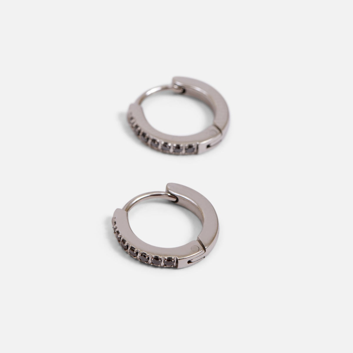 Stainless steel huggies earrings and glittering stones