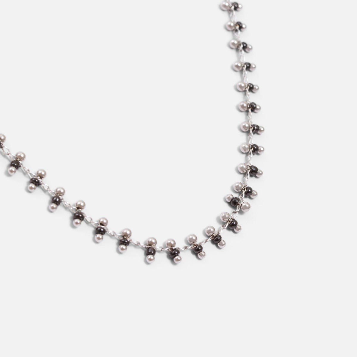 Silvered stainless steel necklace with black beads