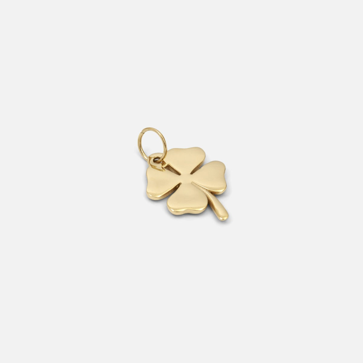Small golden four leaf charm