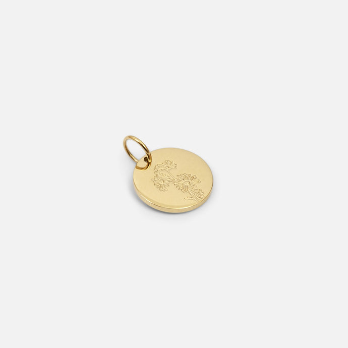 Small symbolic golden birth flower of april 
