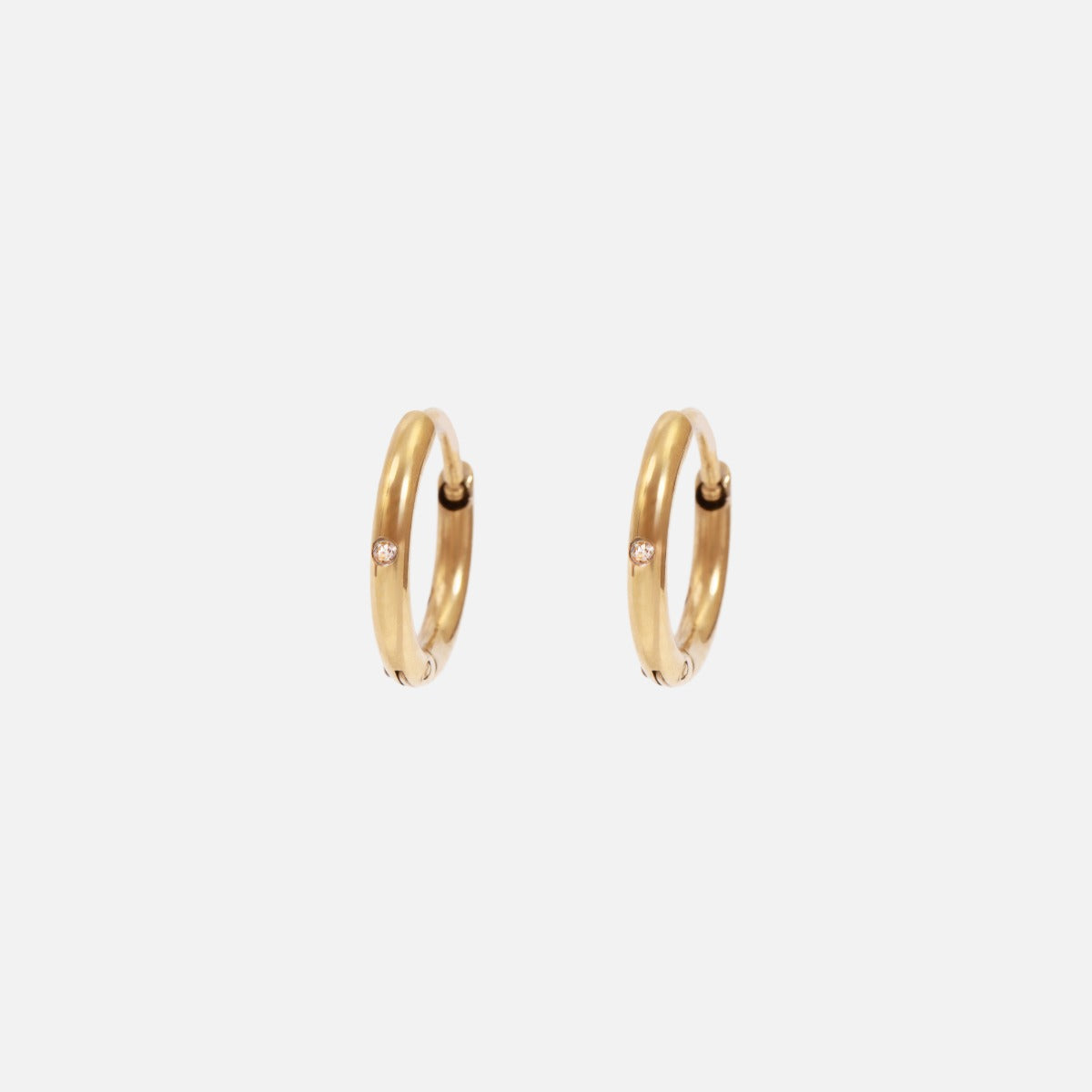Stainless steel golden hoop earrings with stone insertion