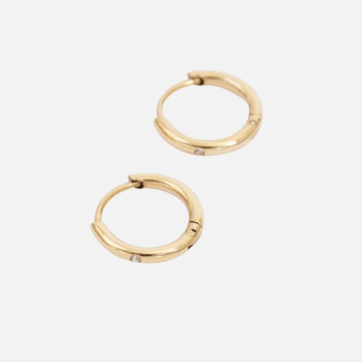 Stainless steel golden hoop earrings with stone insertion