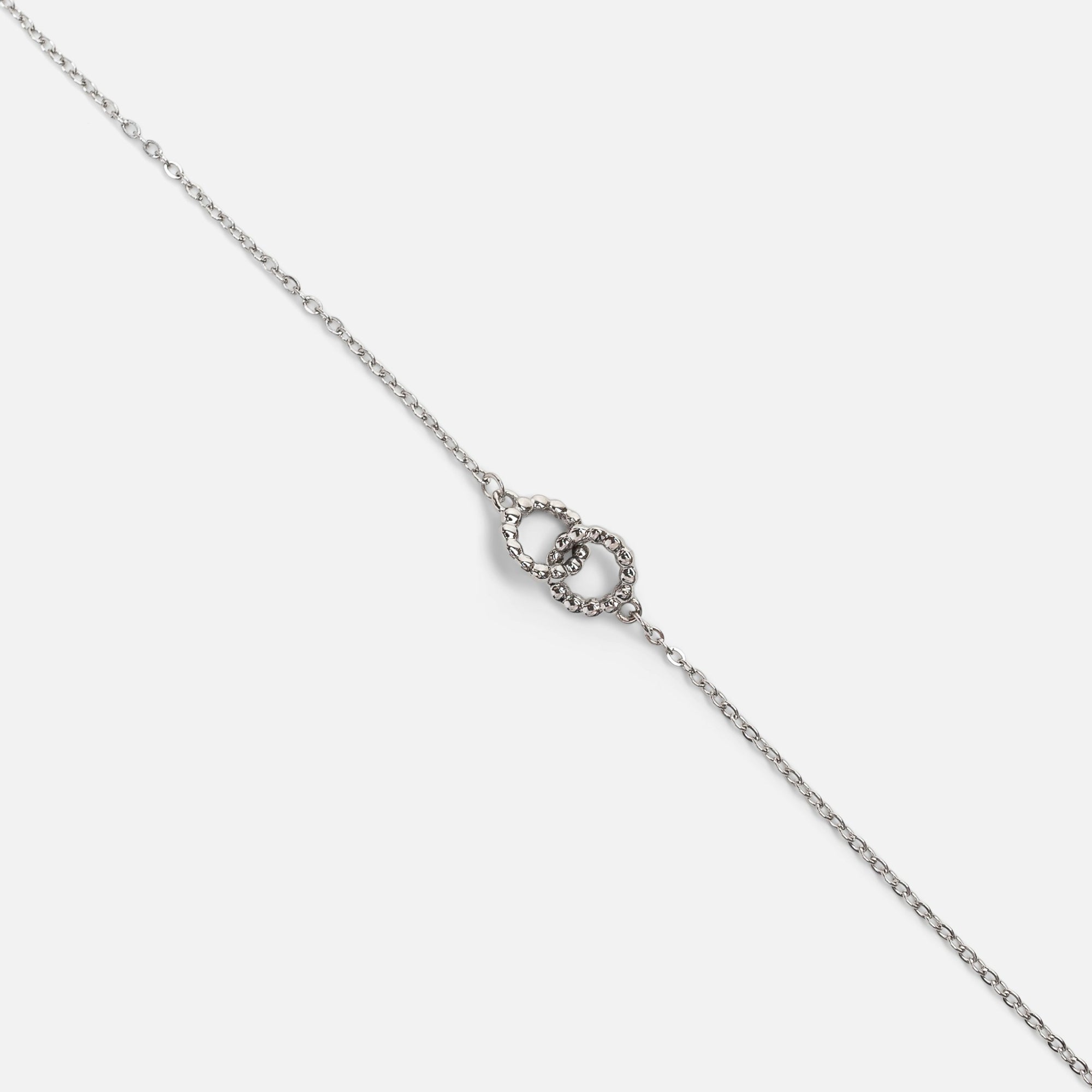 Silver bracelet with two intertwined circles in stainless steel
