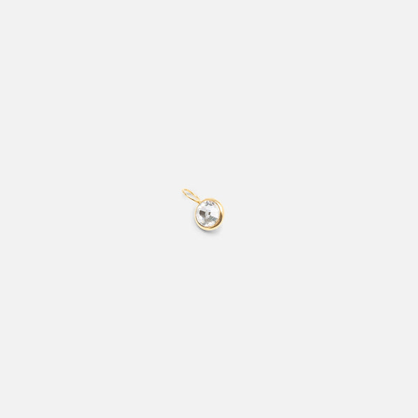Load image into Gallery viewer, Small golden charm with cubic zirconia
